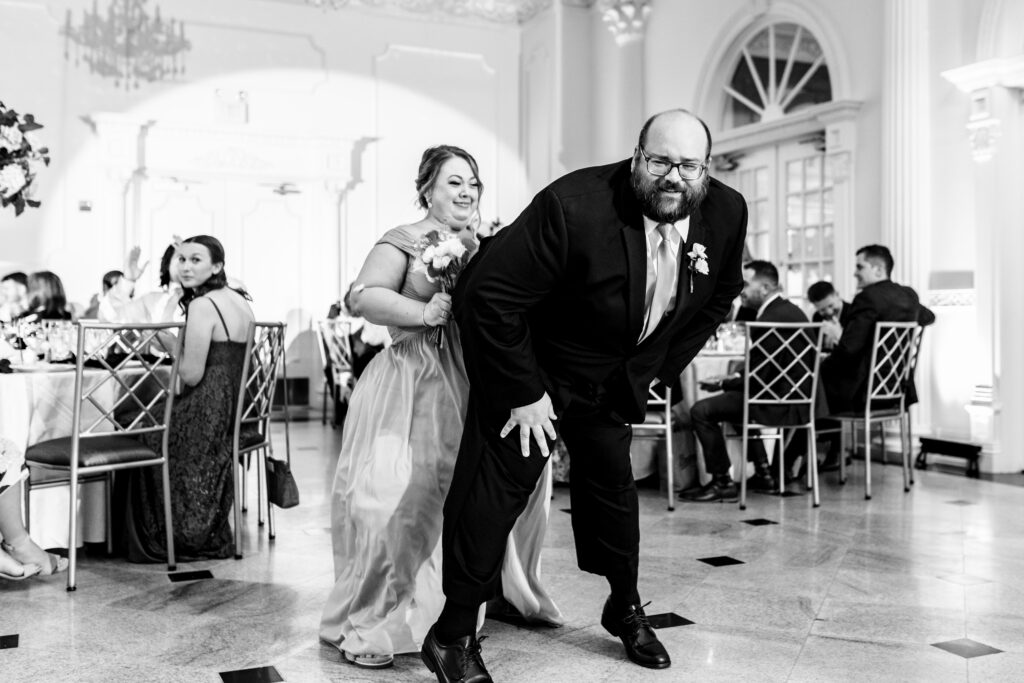 A bride and groom dancing at a wedding reception, captured by New Jersey Wedding Photographer Jarot Bocanegra.