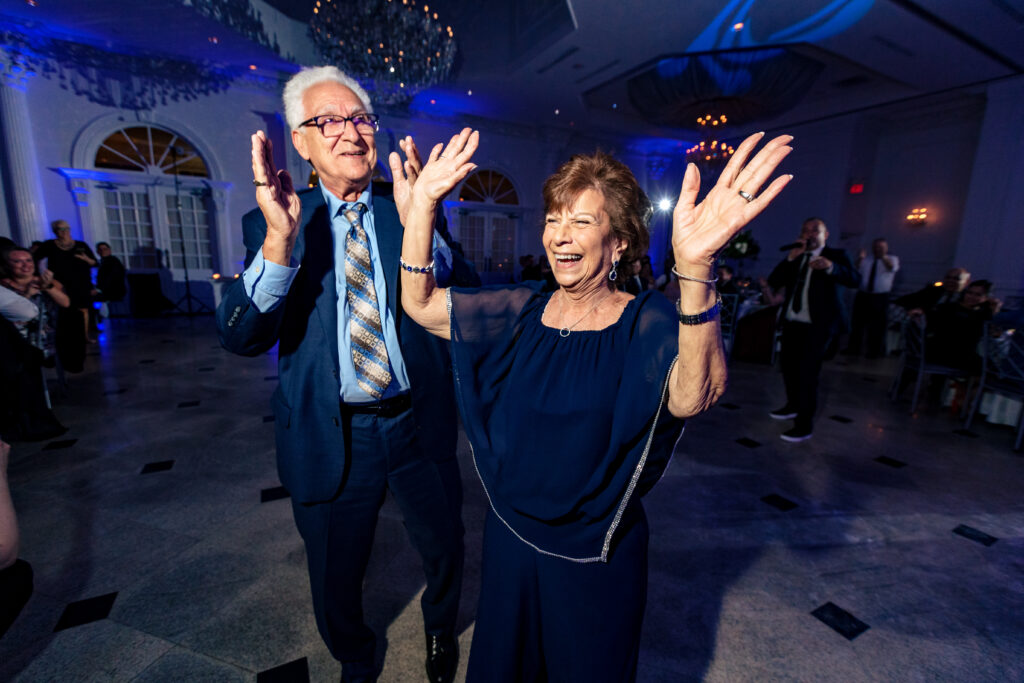 An older couple dancing at a wedding reception, captured by New Jersey Wedding Photographer Jarot Bocanegra.
