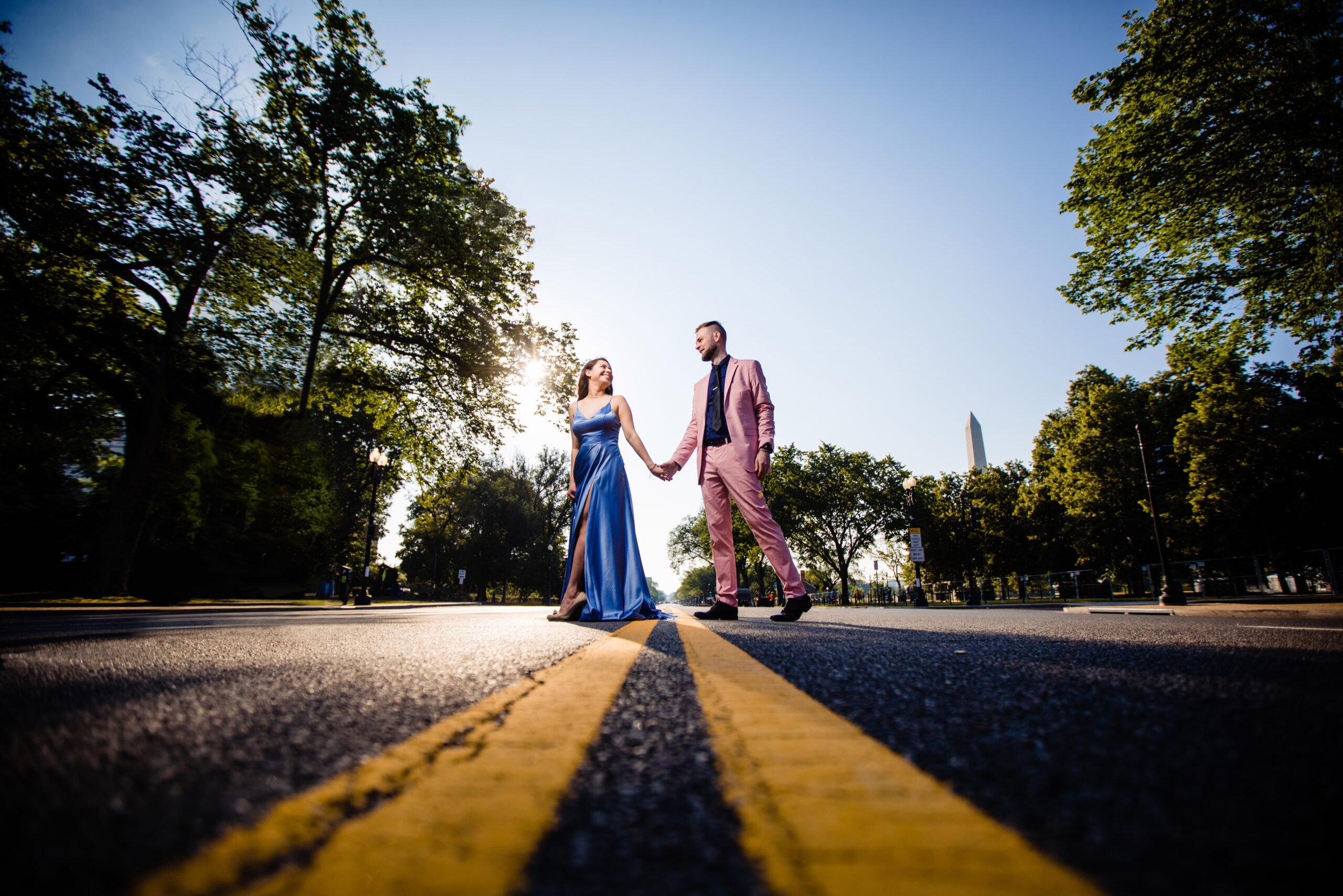 A romantic elopement moment captured on the streets of Washington DC as the couple walks hand in hand. The cityscape provides a picturesque backdrop for their love story, skillfully captured by North Jersey wedding photographer Jarot Bocanegra