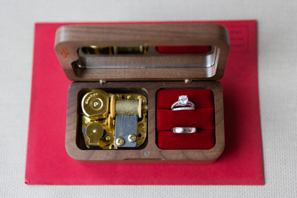 A captured wooden box with an engagement ring in it by New Jersey Wedding Photographer Jarot Bocanegra.