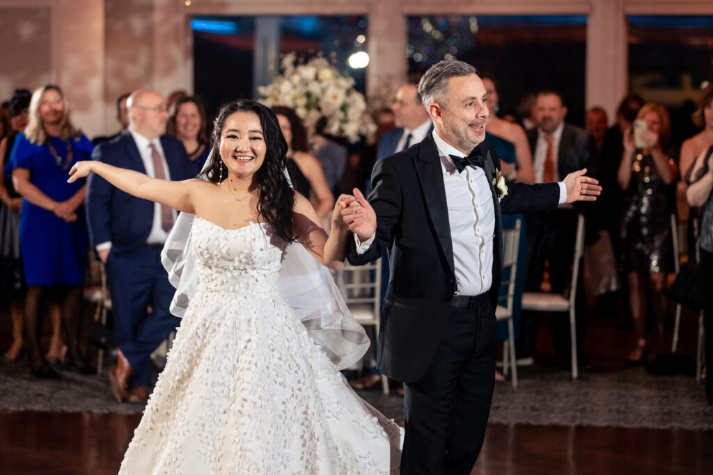 A bride and groom dance at their wedding reception, captured by New Jersey Wedding Photographer Jarot Bocanegra.