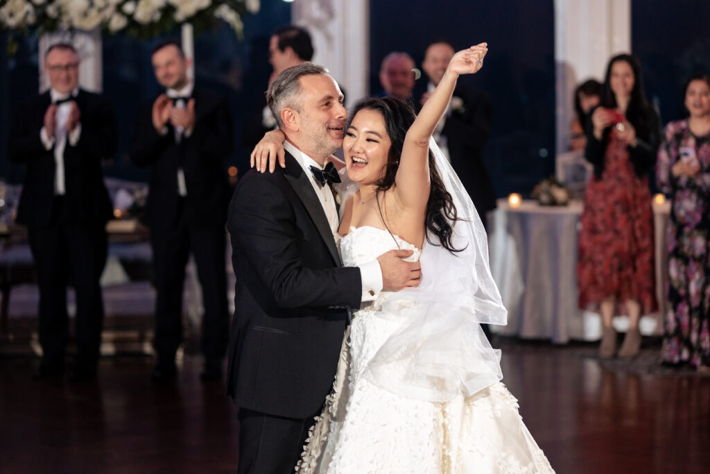 A mesmerizing bride and groom dance, elegantly captured by New Jersey Wedding Photographer Jarot Bocanegra, at their unforgettable wedding reception.