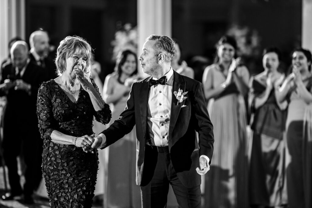 A bride and groom dance at a wedding reception, captured by New Jersey Wedding Photographer Jarot Bocanegra.