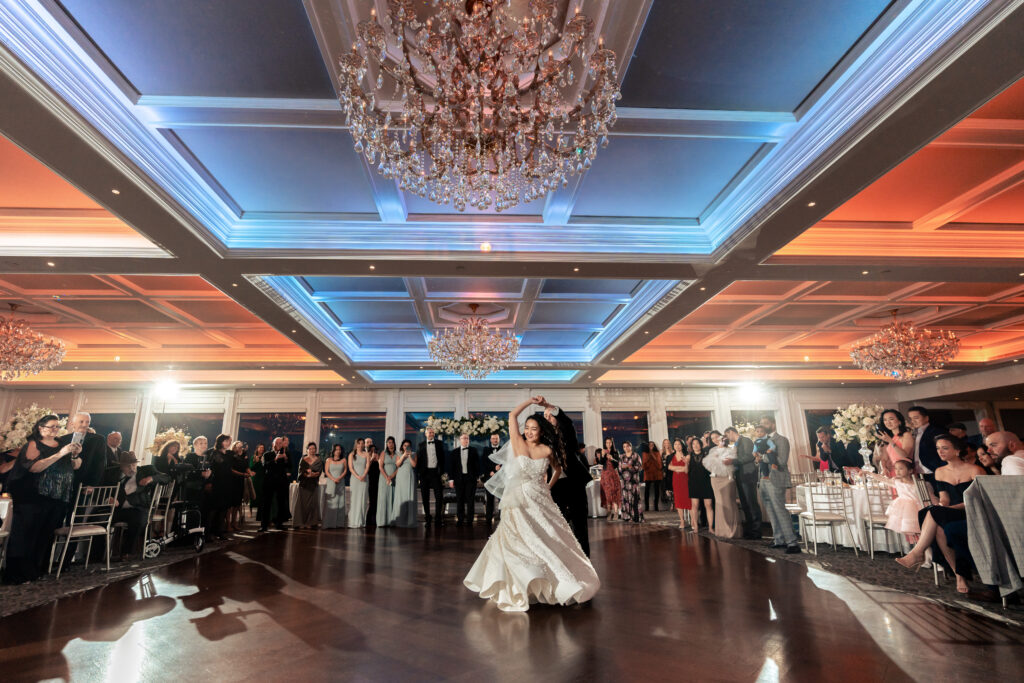 A mesmerizing first dance, captured by New Jersey Wedding Photographer Jarot Bocanegra, at the magical wedding reception of a bride and groom.