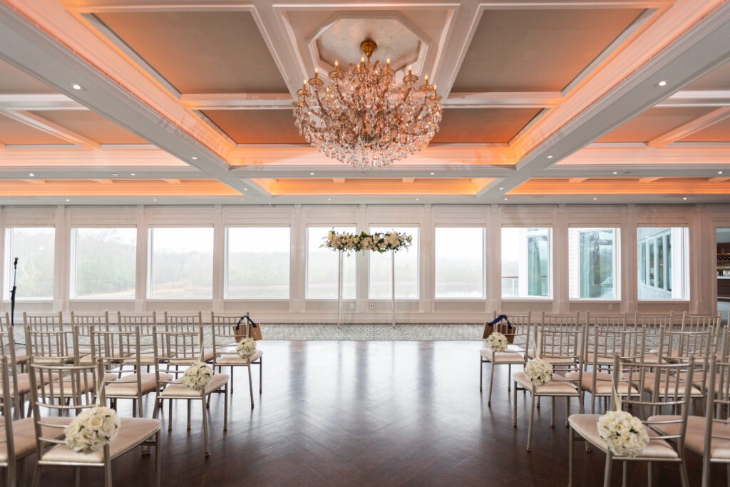 A wedding ceremony set up with chairs, captured by New Jersey Wedding Photographer Jarot Bocanegra.